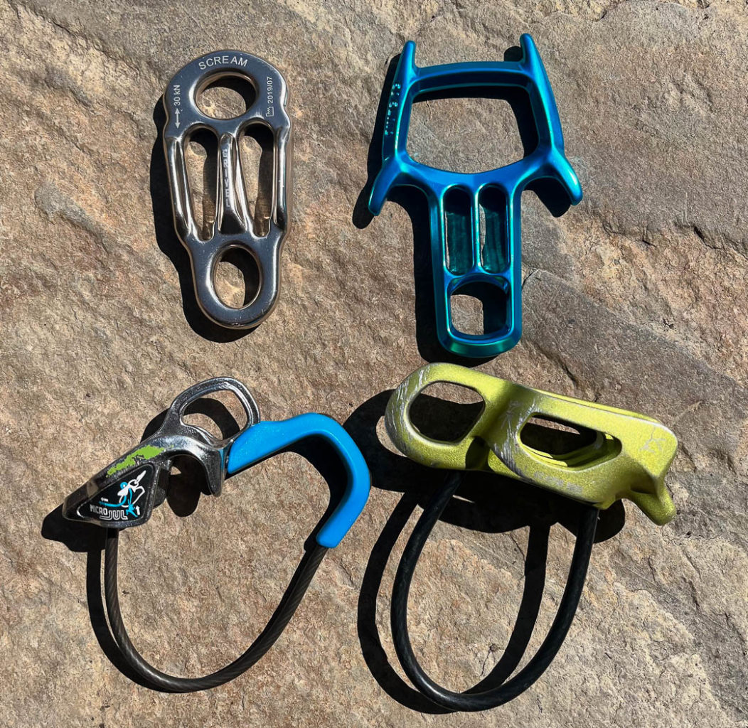 Rappel devices from the top left going clockwise: Grivel Scream, Edelrid Mago 8, BD ATC Alpine Guide, Edelrid MicroJul.