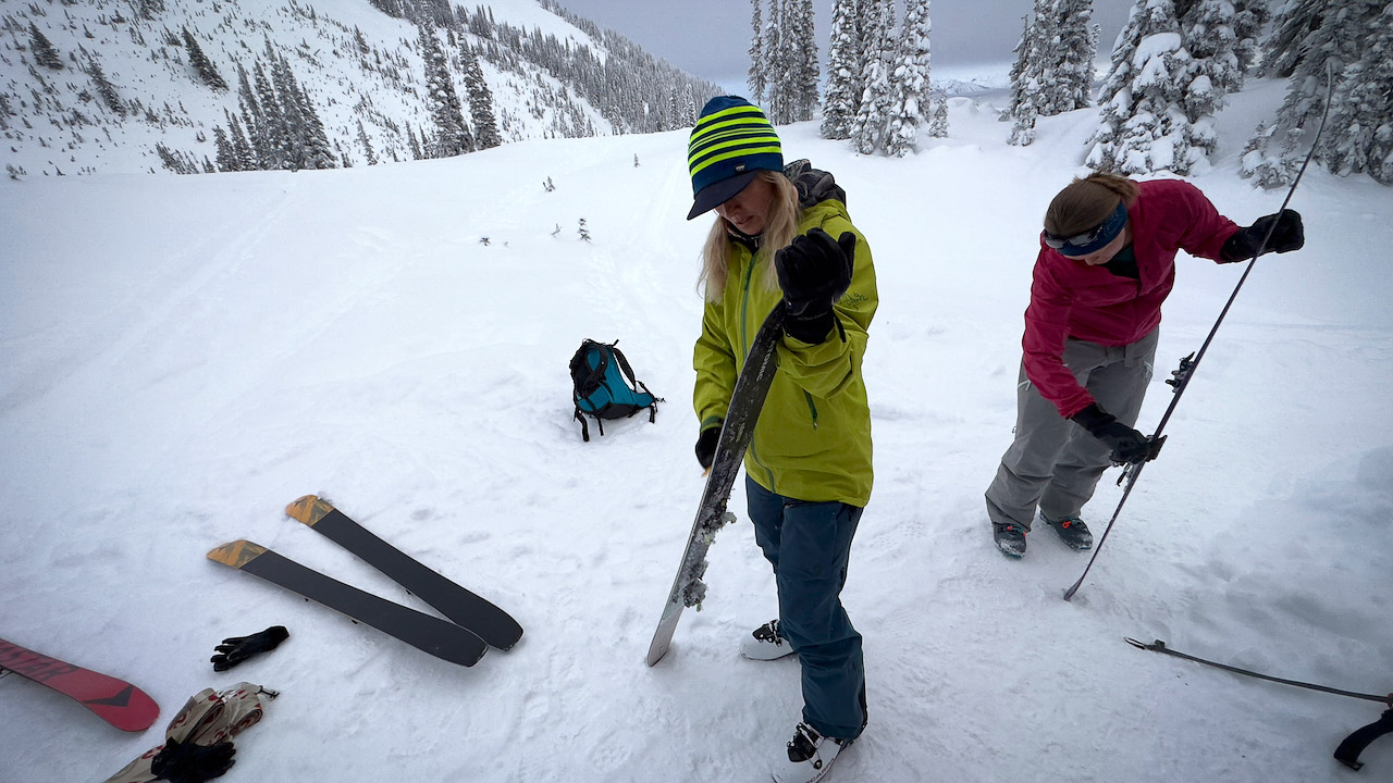 Ensuring skins are adhered properly to the ski base: Sunrise hut outside Golden, BC.