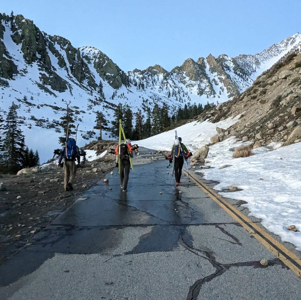 Good people make for good times. Road walking up to Kearsarge Pass for a tour around University Peak.