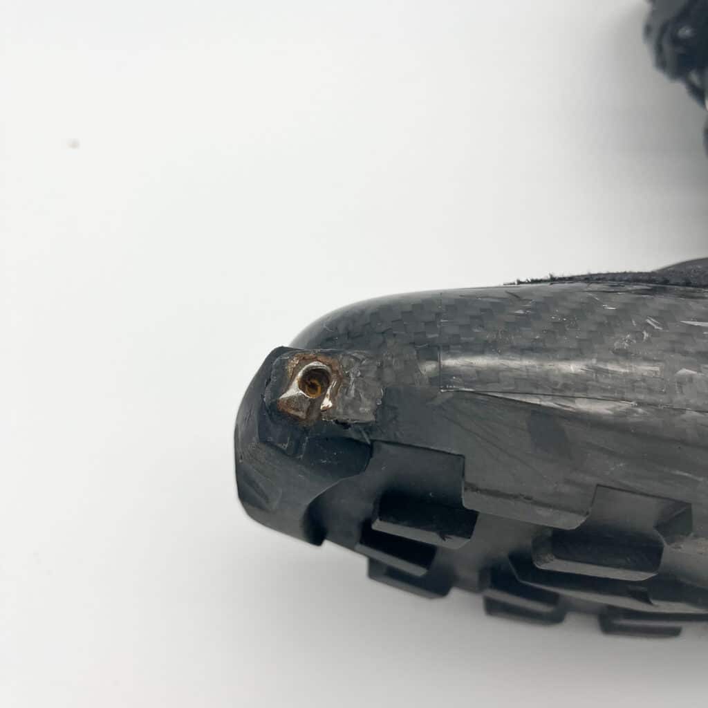 The tech fittings are quite wild—with the toes molded into the carbon and the heel bolted on with no heel lug surrounding it—just a ledge created by the top of the metal hardware.