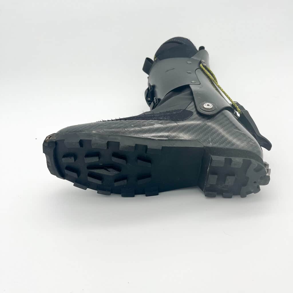 The outsole is molded into the lower scaffo and has an industrial-looking blocky tread paired with a very low profile.