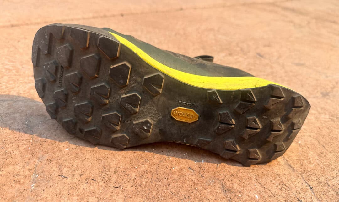 The Vibram Megagrip outer sole with slightly different lug pattern under toe/midfoot and heel. 
