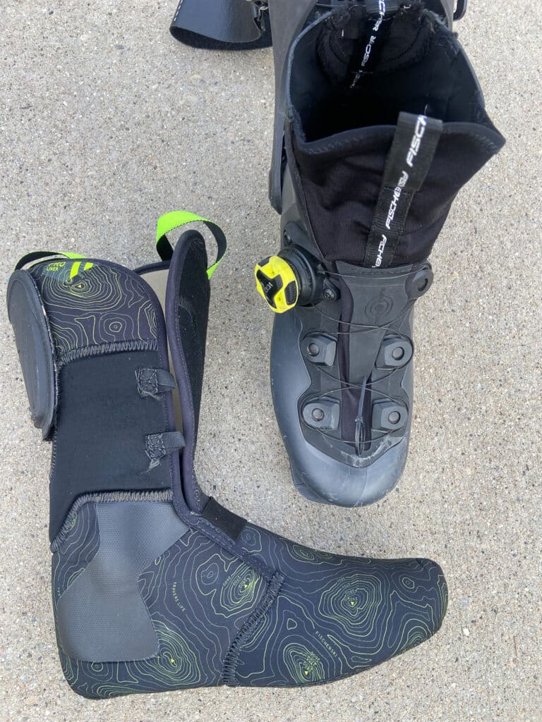 A few notes here. The cuff gaiter (right) is ample and well constructed. The liner (left), in this case, features the spoiler which takes up ample volume for the skinny calf folks. The new liners are very well made. A new high-water benchmark for stock liners.