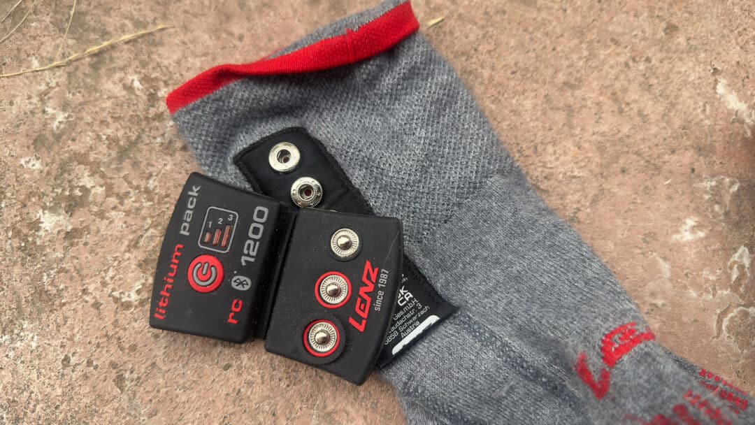 The 1200 series battery shown here attached to the three snap-closures on the sock cuff.
