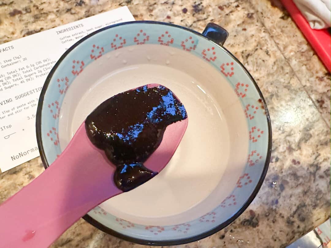 It's a paste. Next step—dissolve the paste in hot water while stirring.