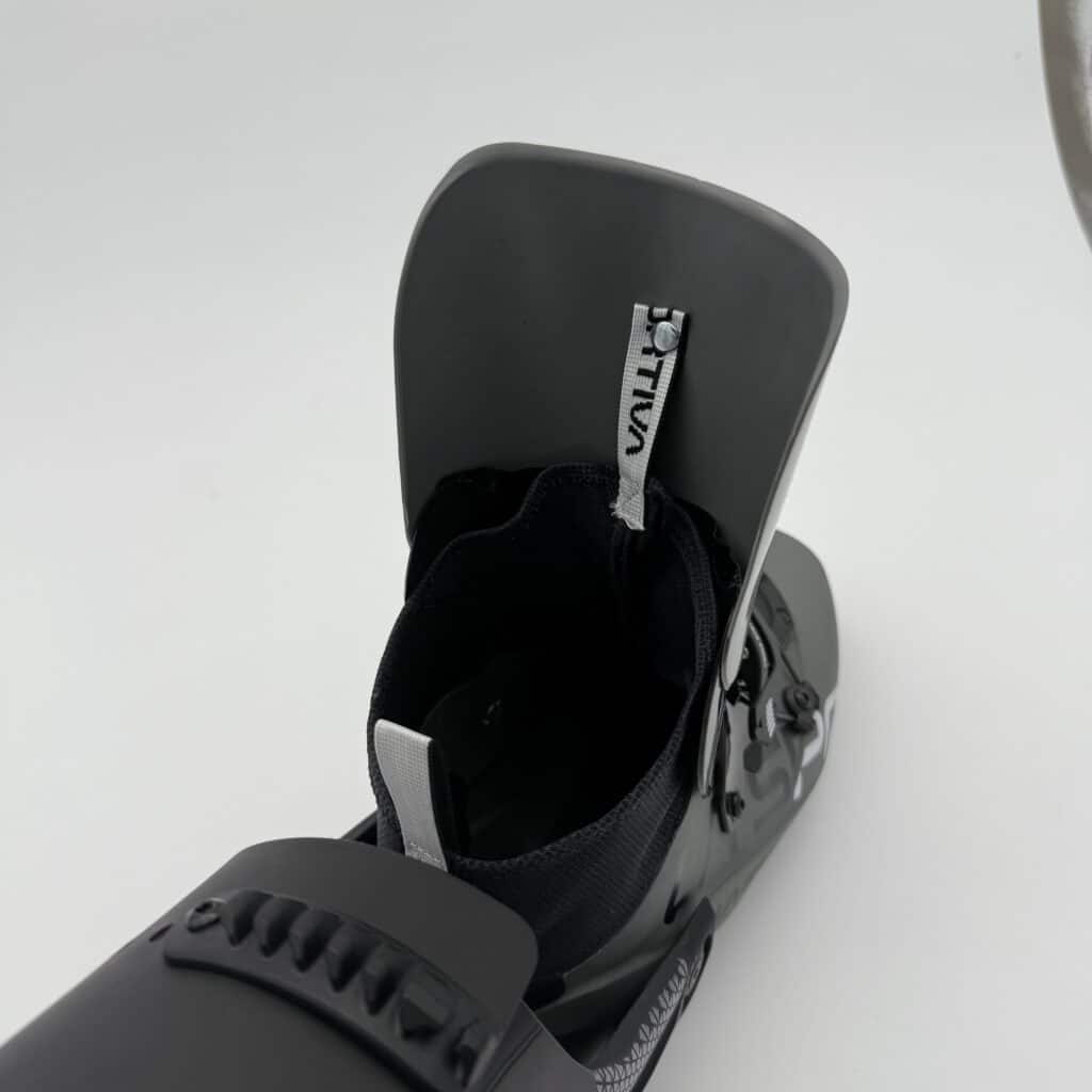 The Kilo XTR features a gaiter and a two-piece plastic cuff making for a more downhill oriented boot relative to the Kilo.