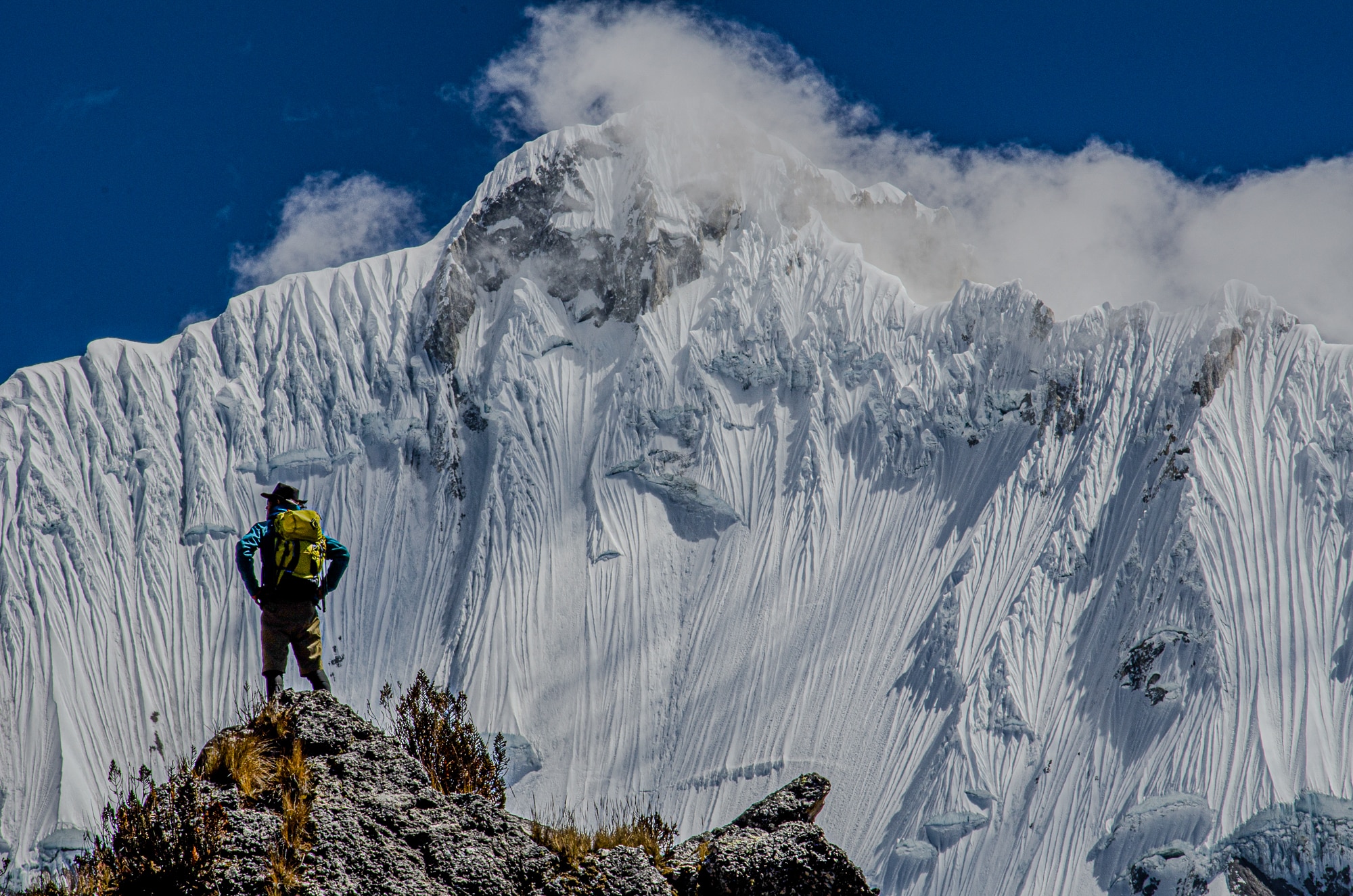 Snow flutes and chutes, Spricenieks taking it all in—Yerupaja, Peru. Photo: Trevor Hunt