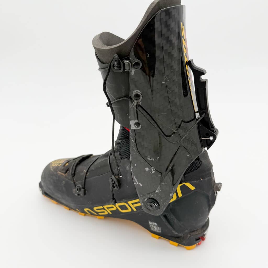 A good view of the 1/2 carbon / 1/2 plastic cuff and the string closure, and throw in walk mode.