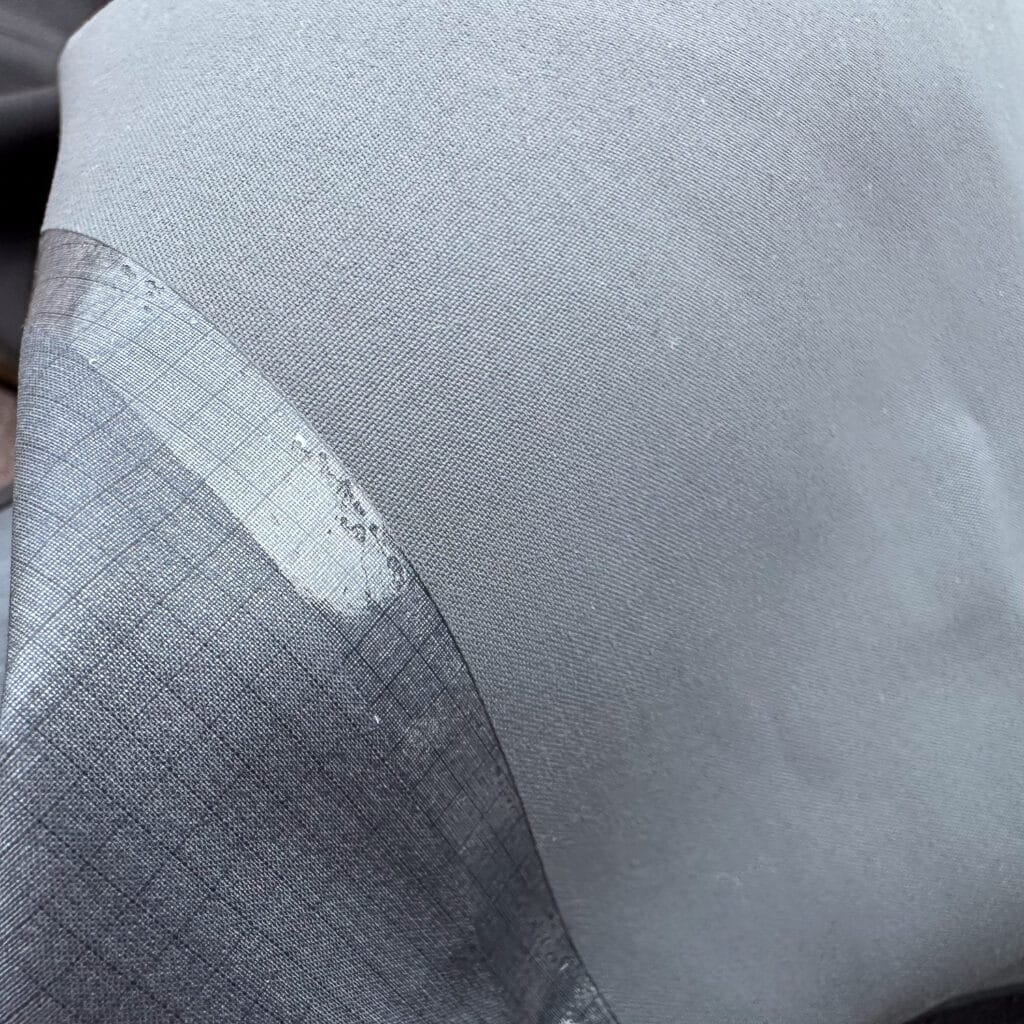 A close-up of the internally laminated cuff guard material. 