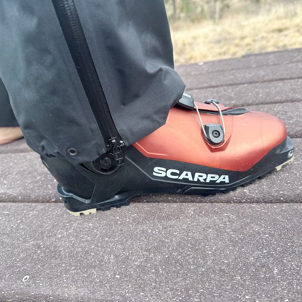 Marketed as a generalist hardshell, the cuff fits nicely over touring boots.