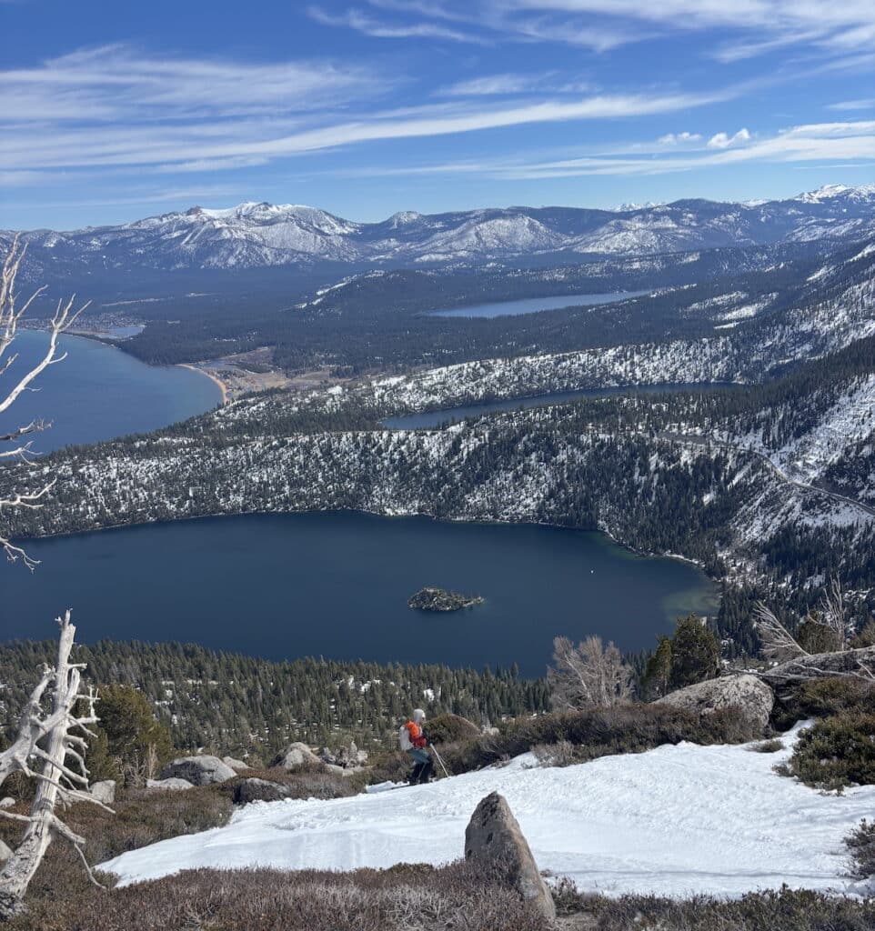 Sepncer hopscotches between snow patches, manzanita, and granite.