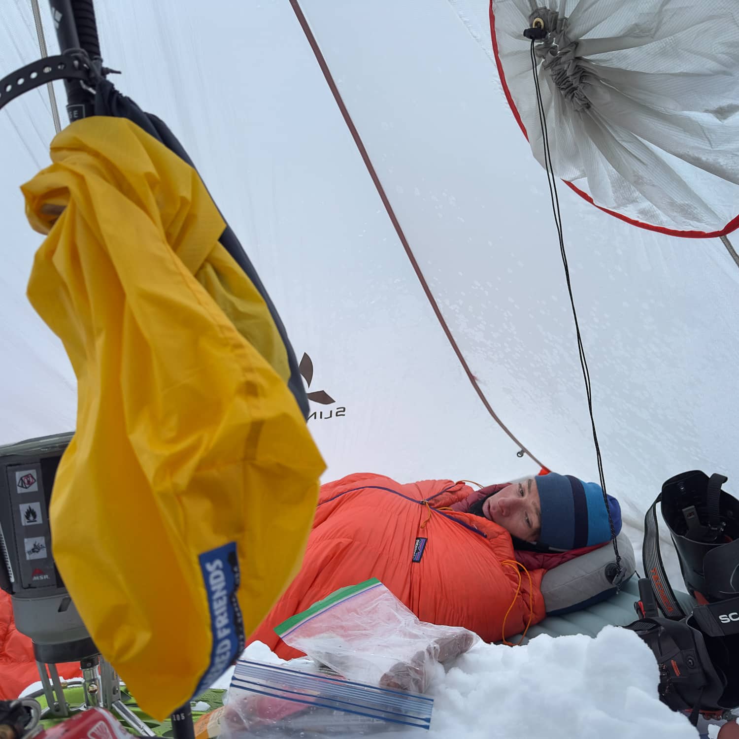 Aidan Whitelaw, a particularly warm sleeper, awakes cocooned in his sleep system: a big down puffy, 20-degree + liner bag.