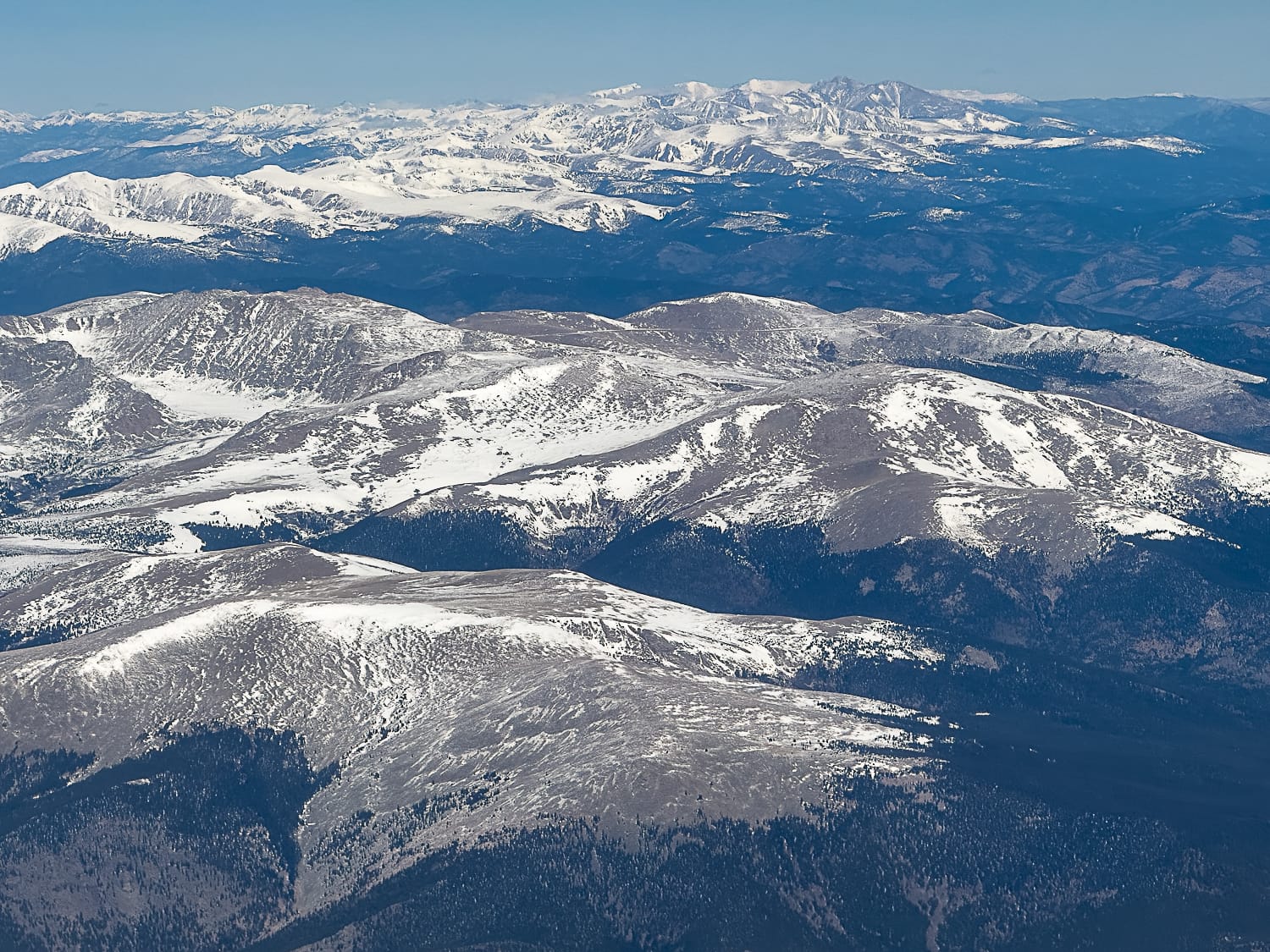 Aerial view of the snow drought in Colorado's Rocky Mountains on March 4, 2026. Photo: Mitch Tobin
