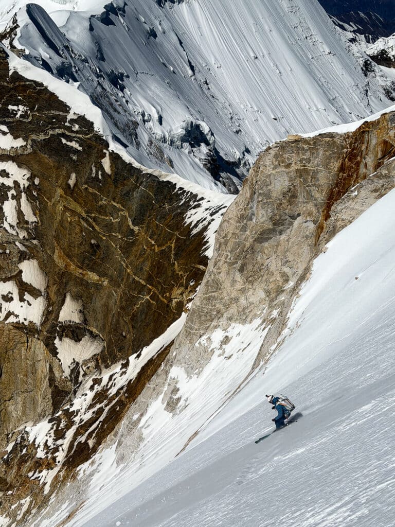 Tiphaine skiing the middle portion of Meru Central’s West Face. Photo: Boris Langenstein